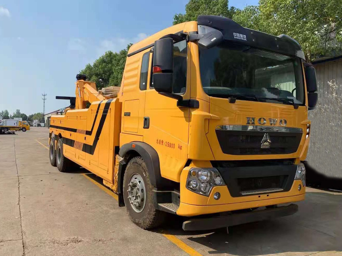 Rear dual-bridge tow and drag integrated clearing vehicle